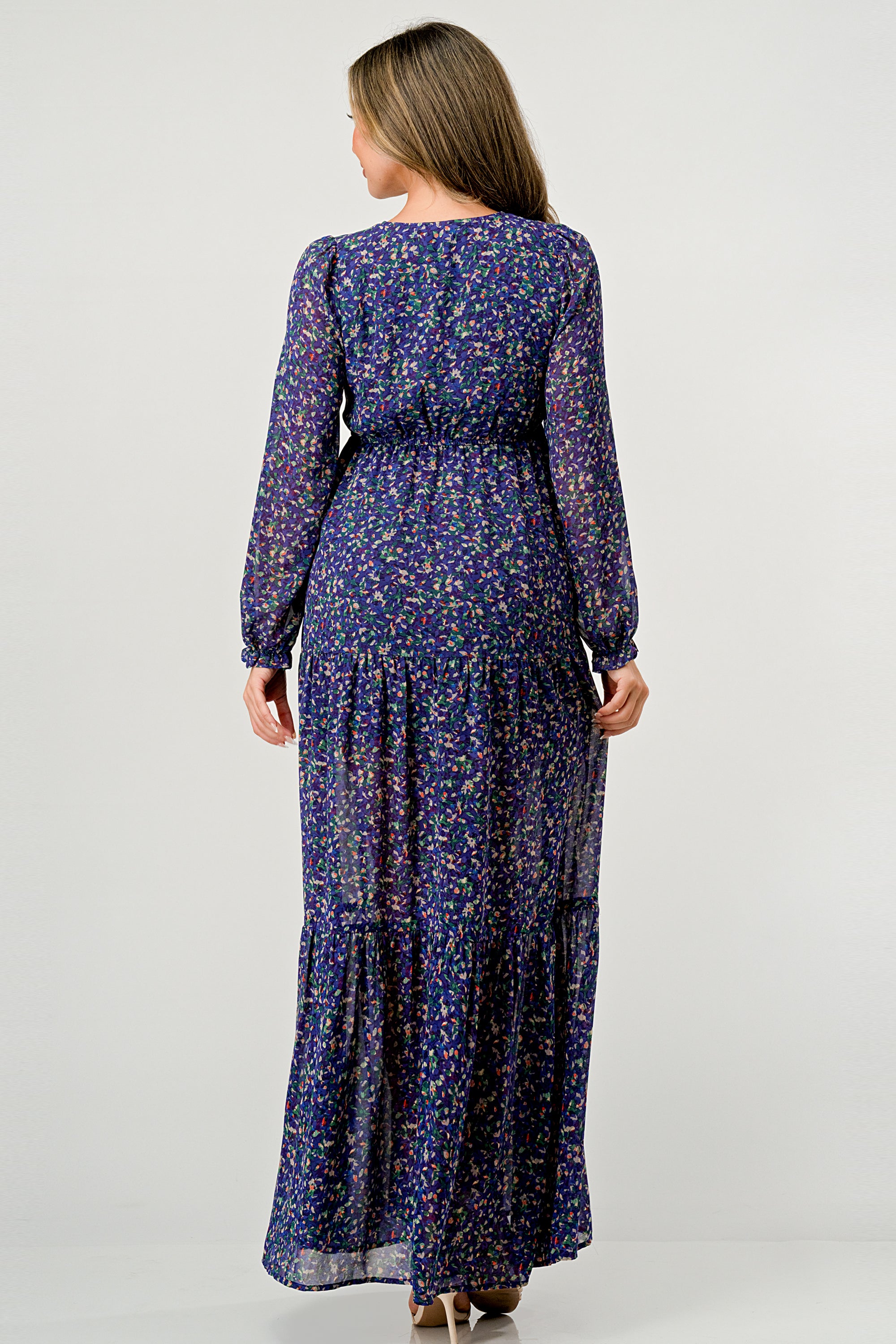 Floral V-Neck Long Sleeve Maxi Dress featuring a tiered skirt and side slit, elegantly displayed on a mannequin.
