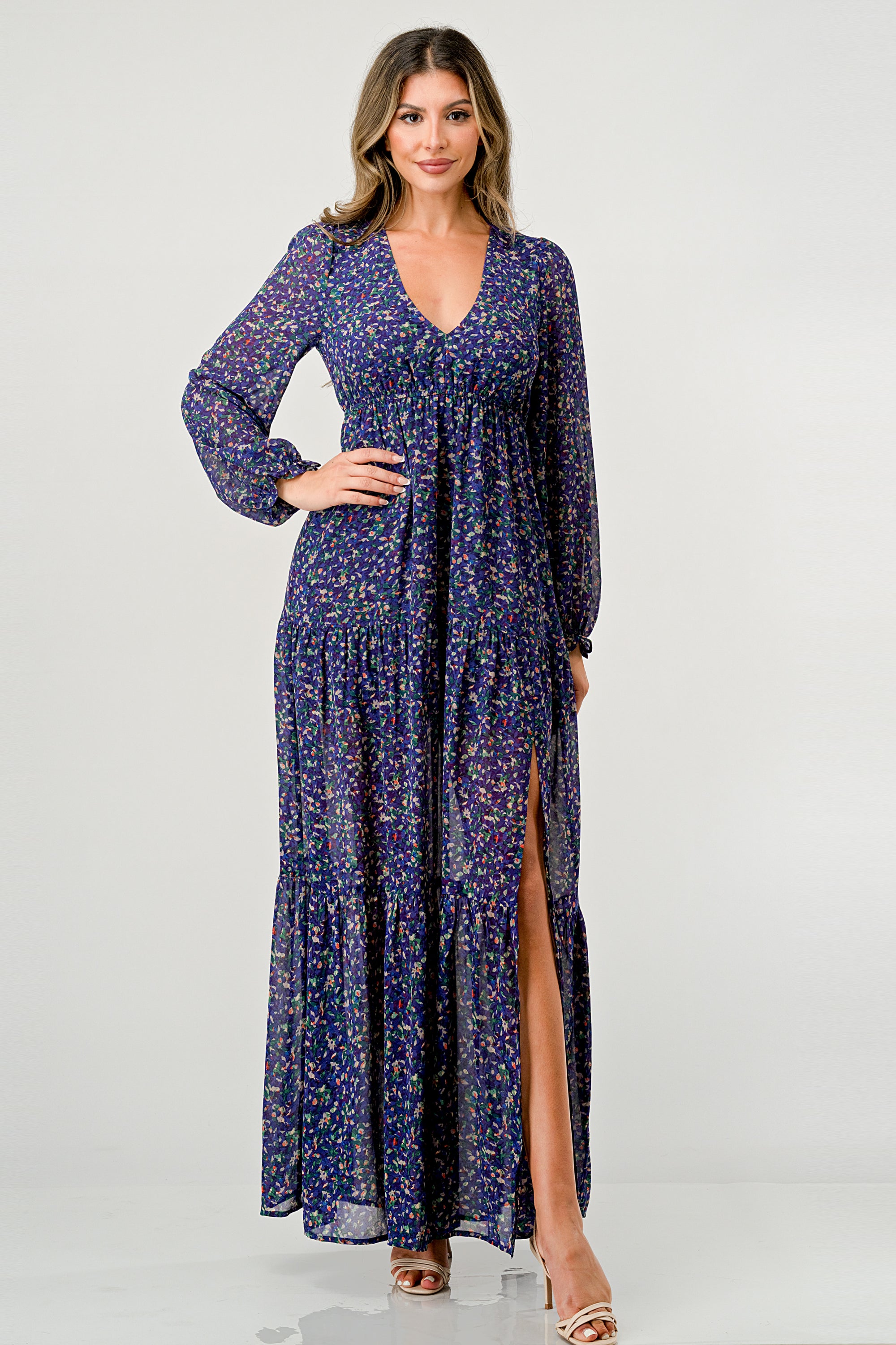 Floral V-Neck Long Sleeve Maxi Dress featuring a tiered skirt and side slit, elegantly displayed on a mannequin.
