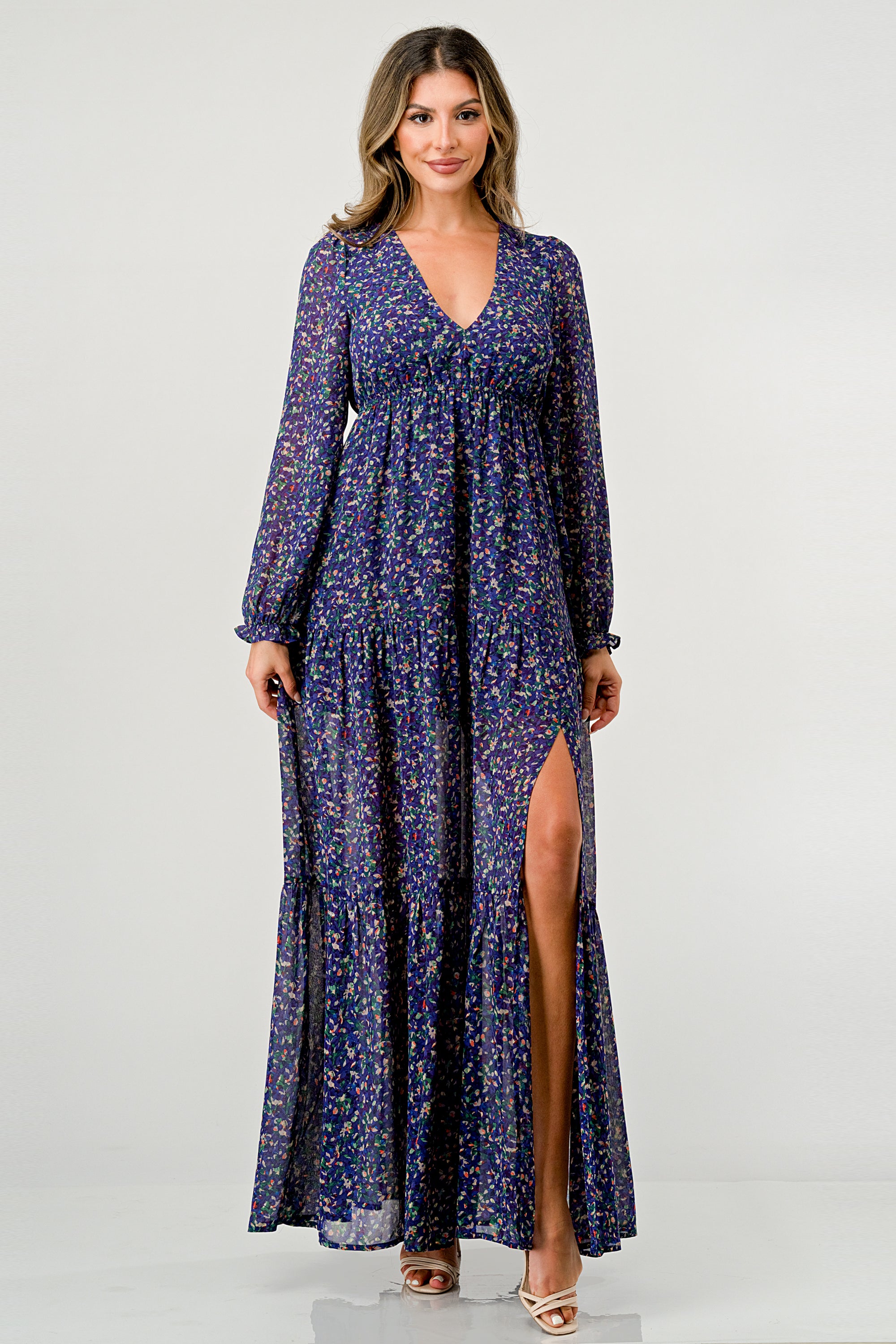 Floral V-Neck Long Sleeve Maxi Dress featuring a tiered skirt and side slit, elegantly displayed on a mannequin.