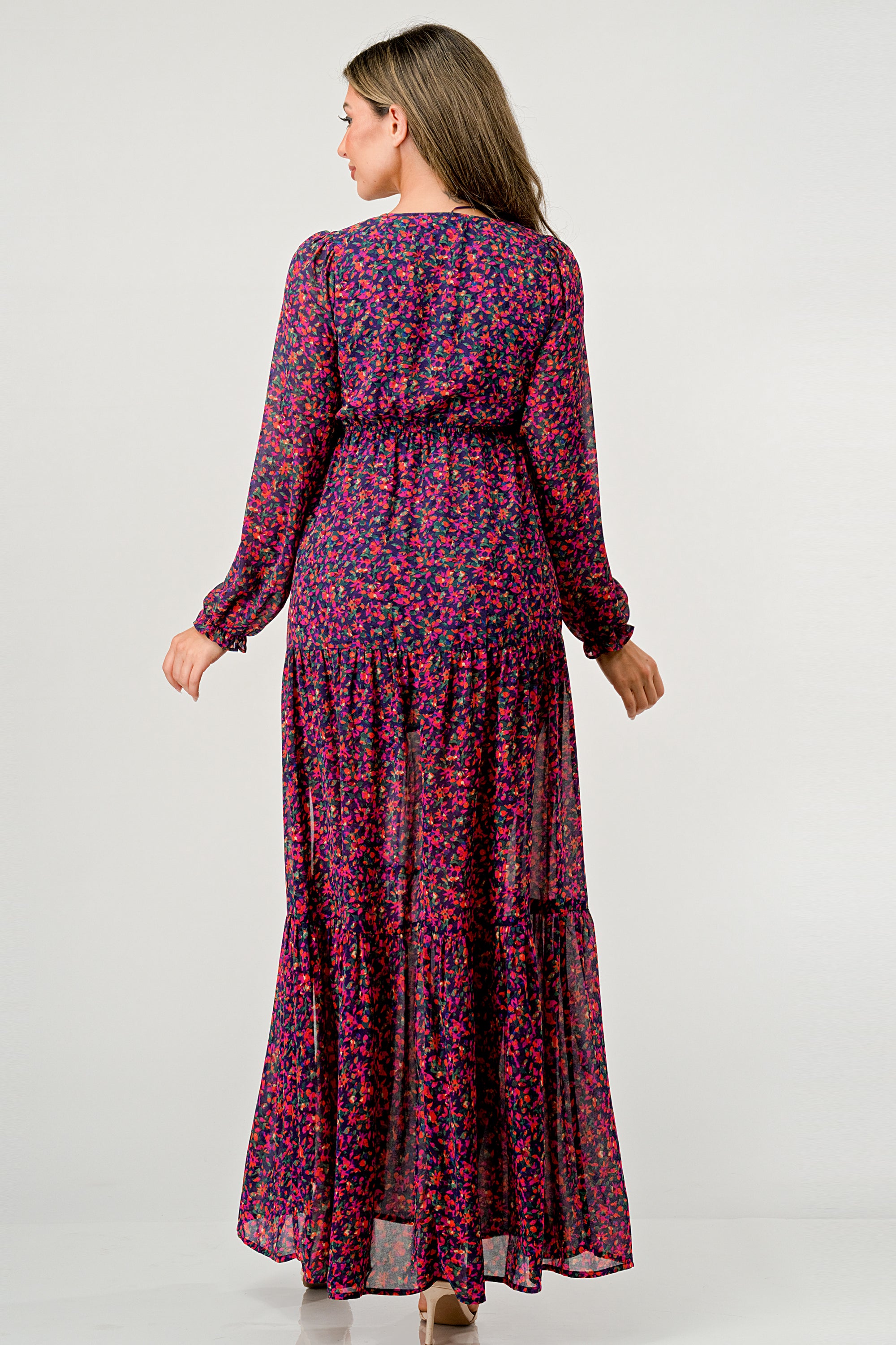 Floral V-Neck Long Sleeve Maxi Dress featuring a tiered skirt and side slit, elegantly displayed on a mannequin.