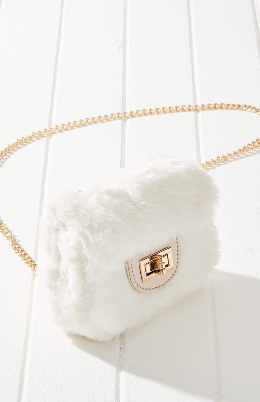 Fluffy Micro Mini Bag made of plush vegan fur and leather, featuring a chain strap and twist lock closure, designed in Australia.