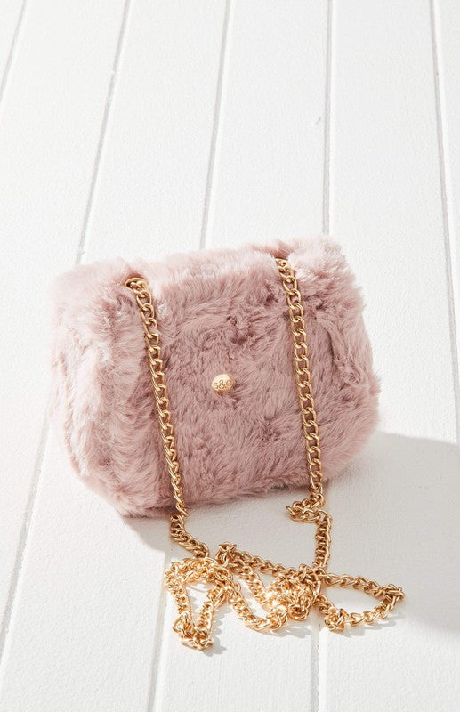 Fluffy Micro Mini Bag made of plush vegan fur and leather, featuring a chain strap and twist lock closure, designed in Australia.