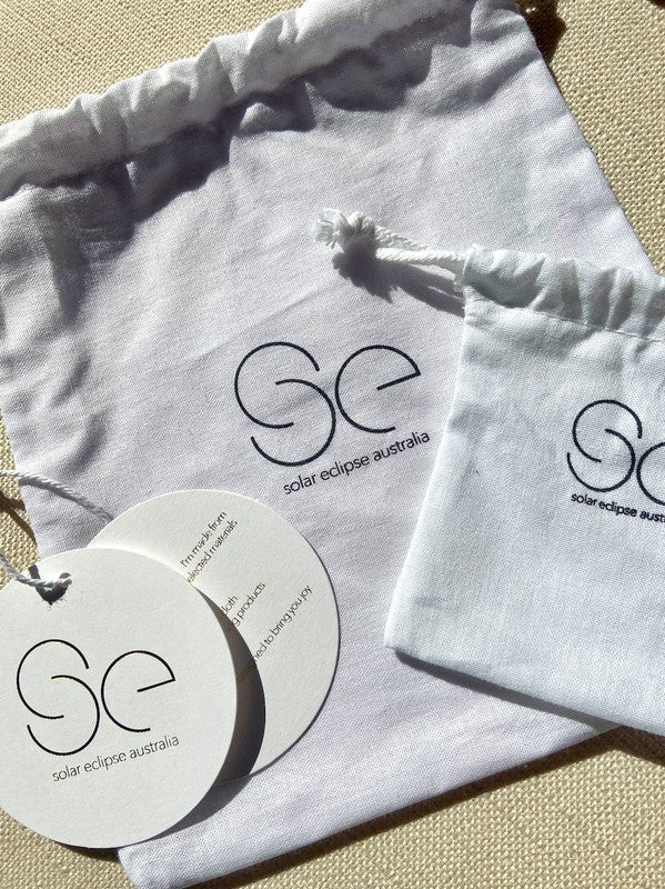 Fluffy Micro Mini Bag made of plush vegan fur and leather, featuring a chain strap and twist lock closure, designed in Australia.