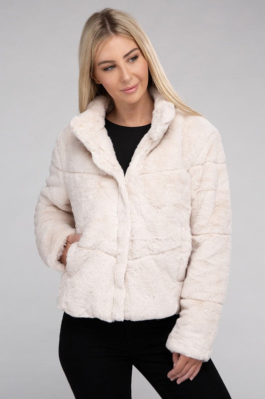 A cozy Fluffy Zip-Up Sweater Jacket in a soft texture, featuring a zip-up front and pockets, perfect for chilly days.