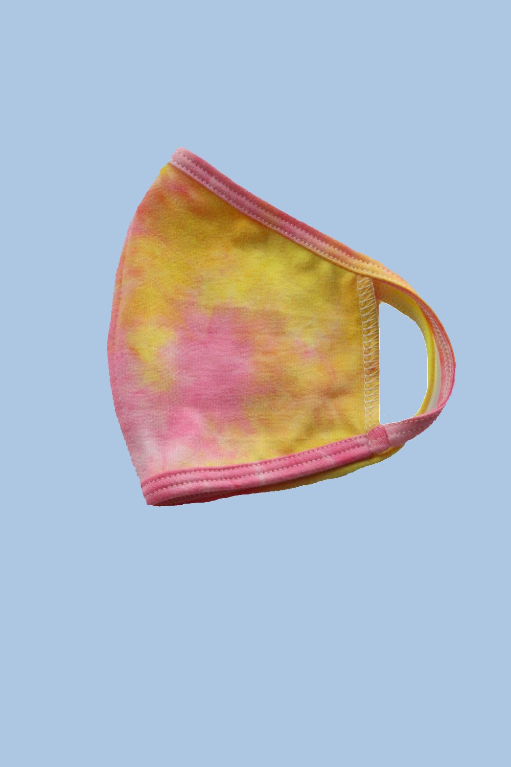 Colorful kids' reusable cloth face masks featuring tie dye, star, and ditsy patterns, designed for comfort and safety.