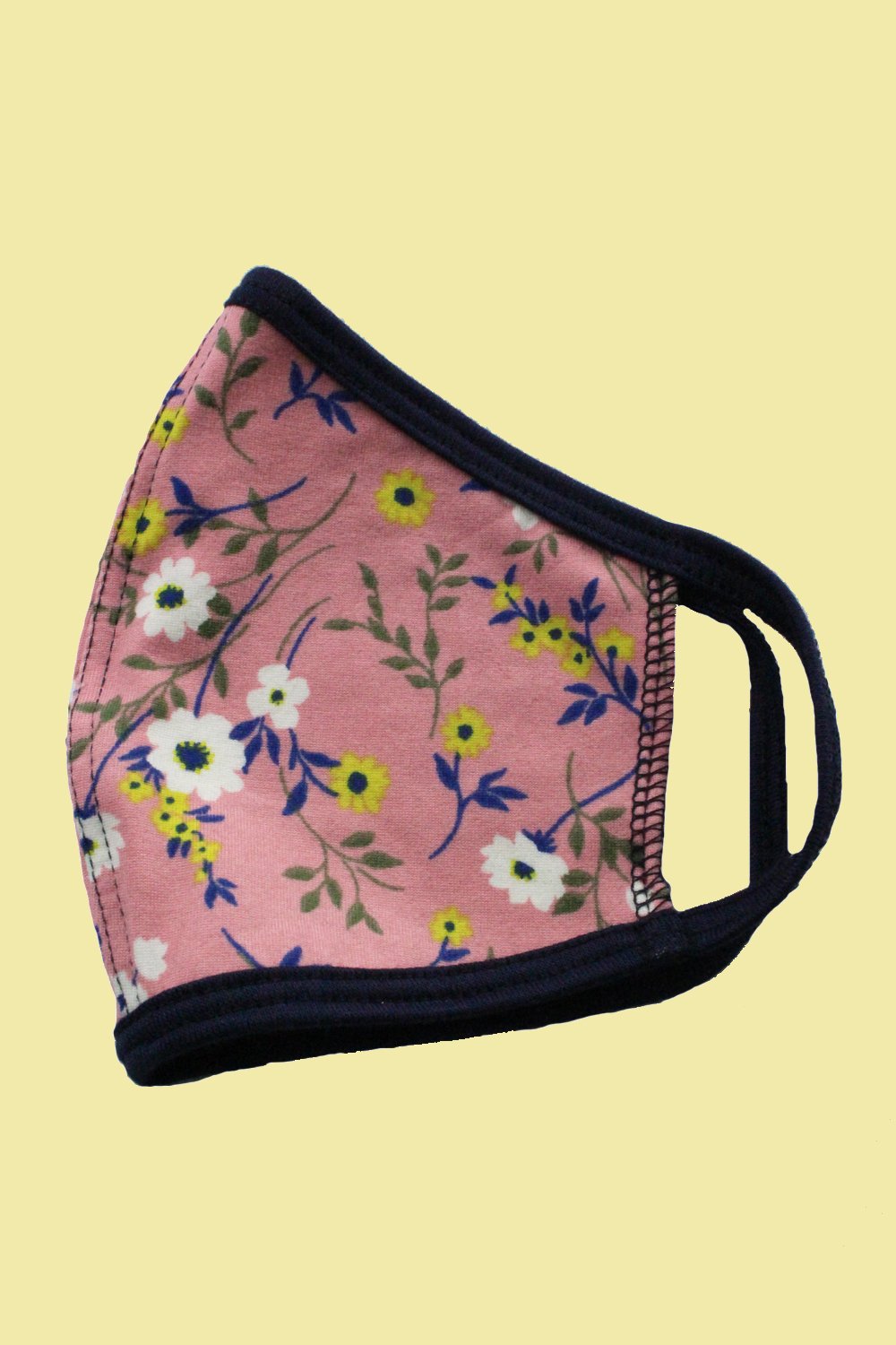 Colorful kids' reusable cloth face masks featuring tie dye, star, and ditsy patterns, designed for comfort and safety.