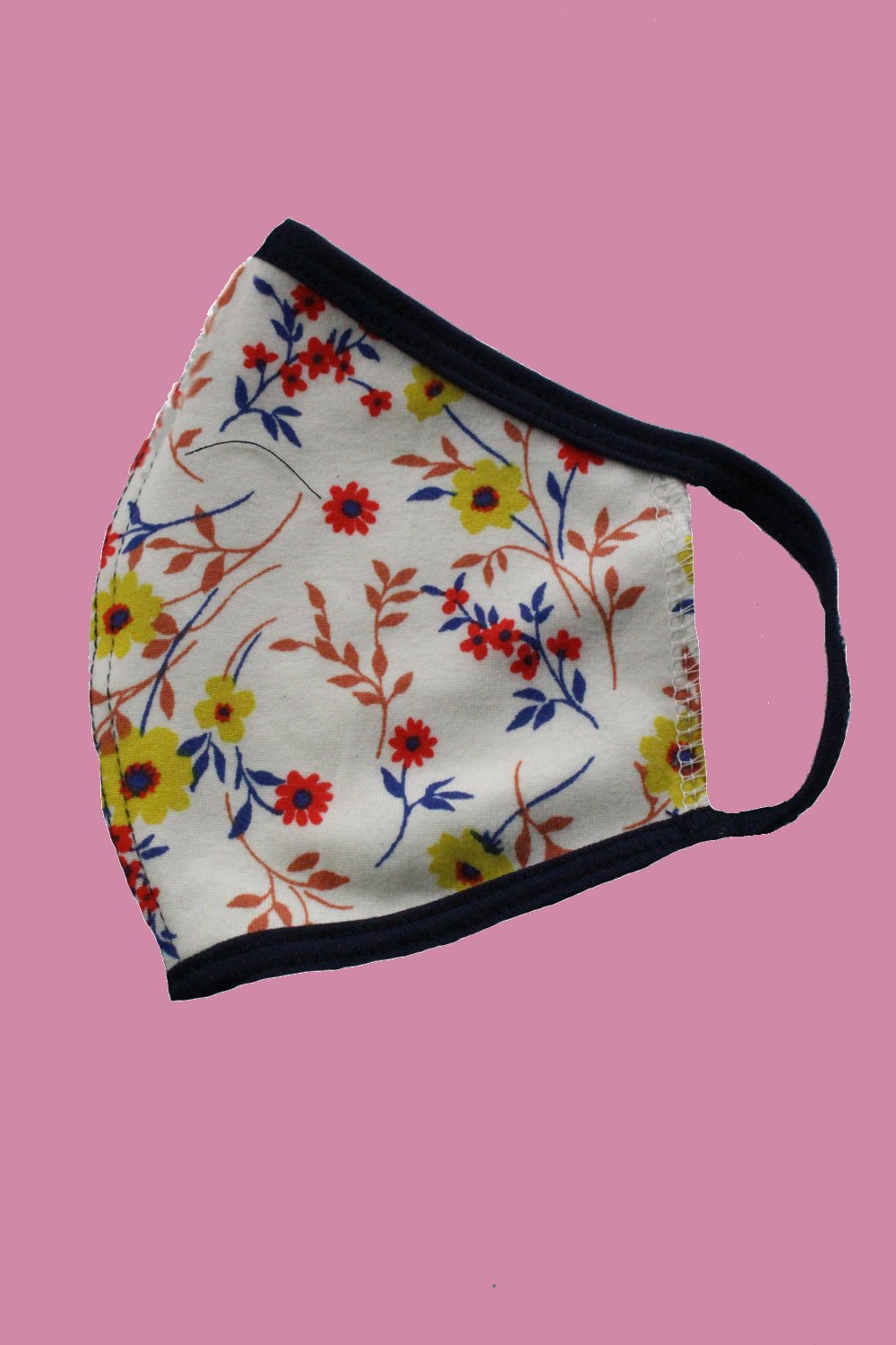 Colorful kids' reusable cloth face masks featuring tie dye, star, and ditsy patterns, designed for comfort and safety.