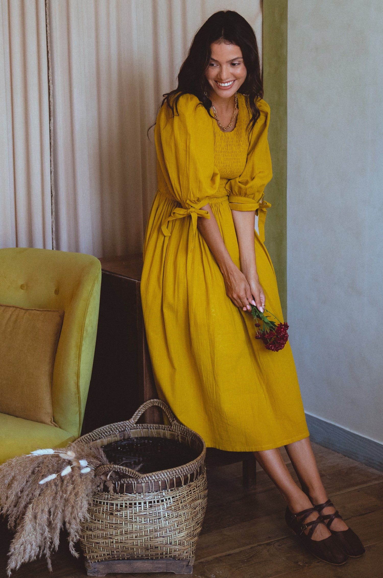 Freya Smocked Linen Midi Dress featuring a smocked bodice and tie-up puffy sleeves in a beautiful crinkle linen fabric.