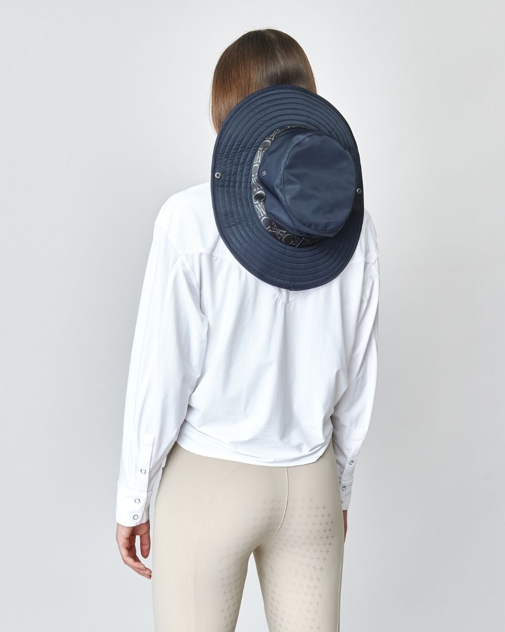 Front Tie Riding Shirt in White, featuring a self-tie front and modern equestrian design, made from soft Italian fabric.