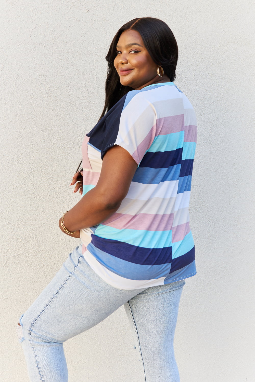 Full Size Colorblock Tunic Top in Navy Aqua featuring dolman sleeves and a vibrant pocket detail.