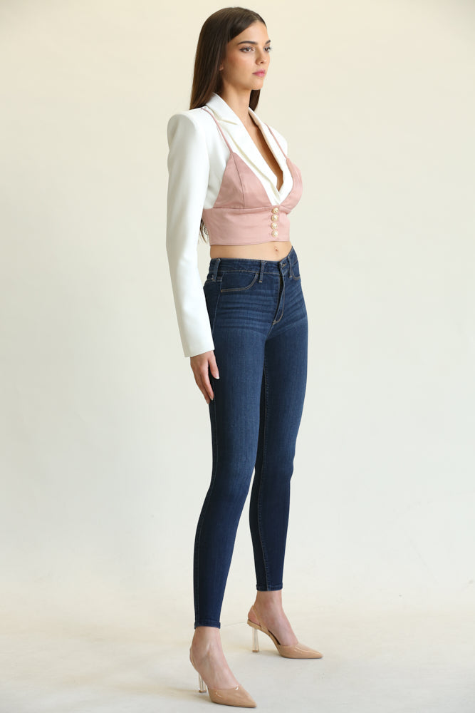 Gabriella Top featuring a notched lapel collar, padded shoulders, and gold button front closure, styled elegantly.