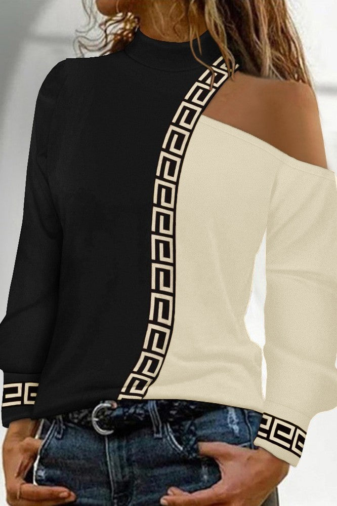 Elegant black and beige geometric print top with high neck, cold shoulder, and long sleeves, designed for comfort and style.