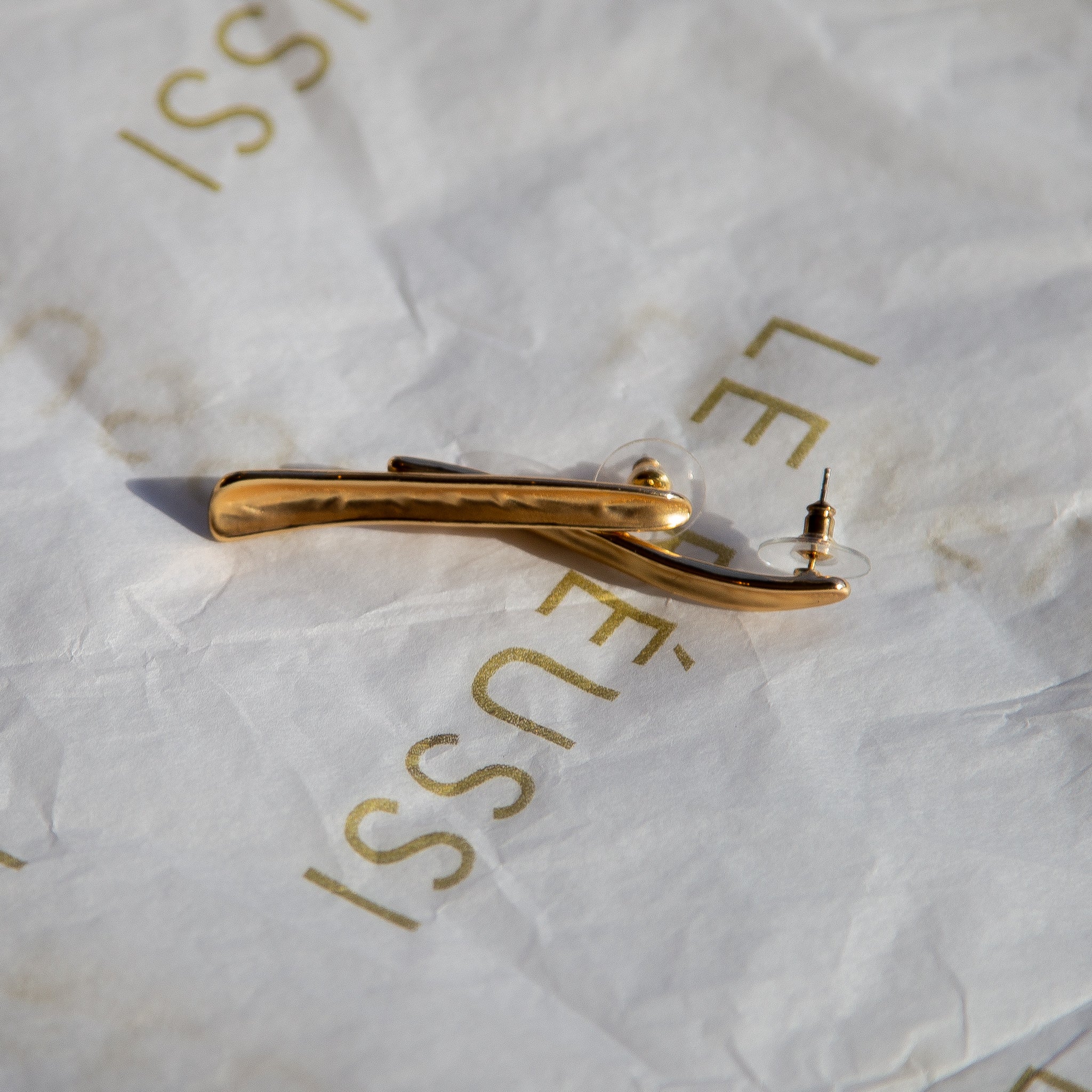 Gilded Bar Elegance Stud Earrings showcasing a sleek and stylish design, crafted in Italy with a luxurious finish.