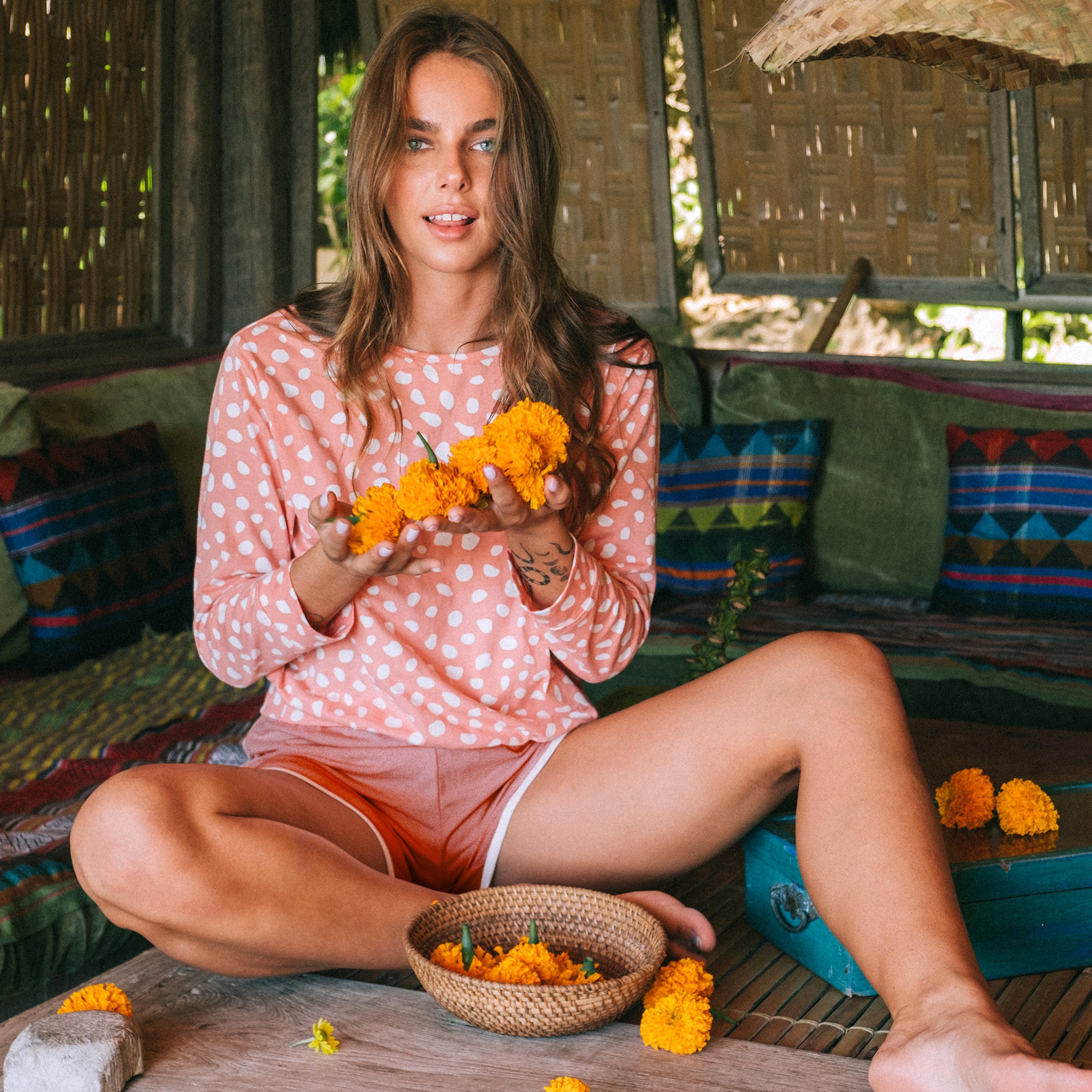 GIRL Seaside Runner Bamboo Shorts in Desert Rose, showcasing lightweight bamboo fabric, elastic waist, and back pocket.