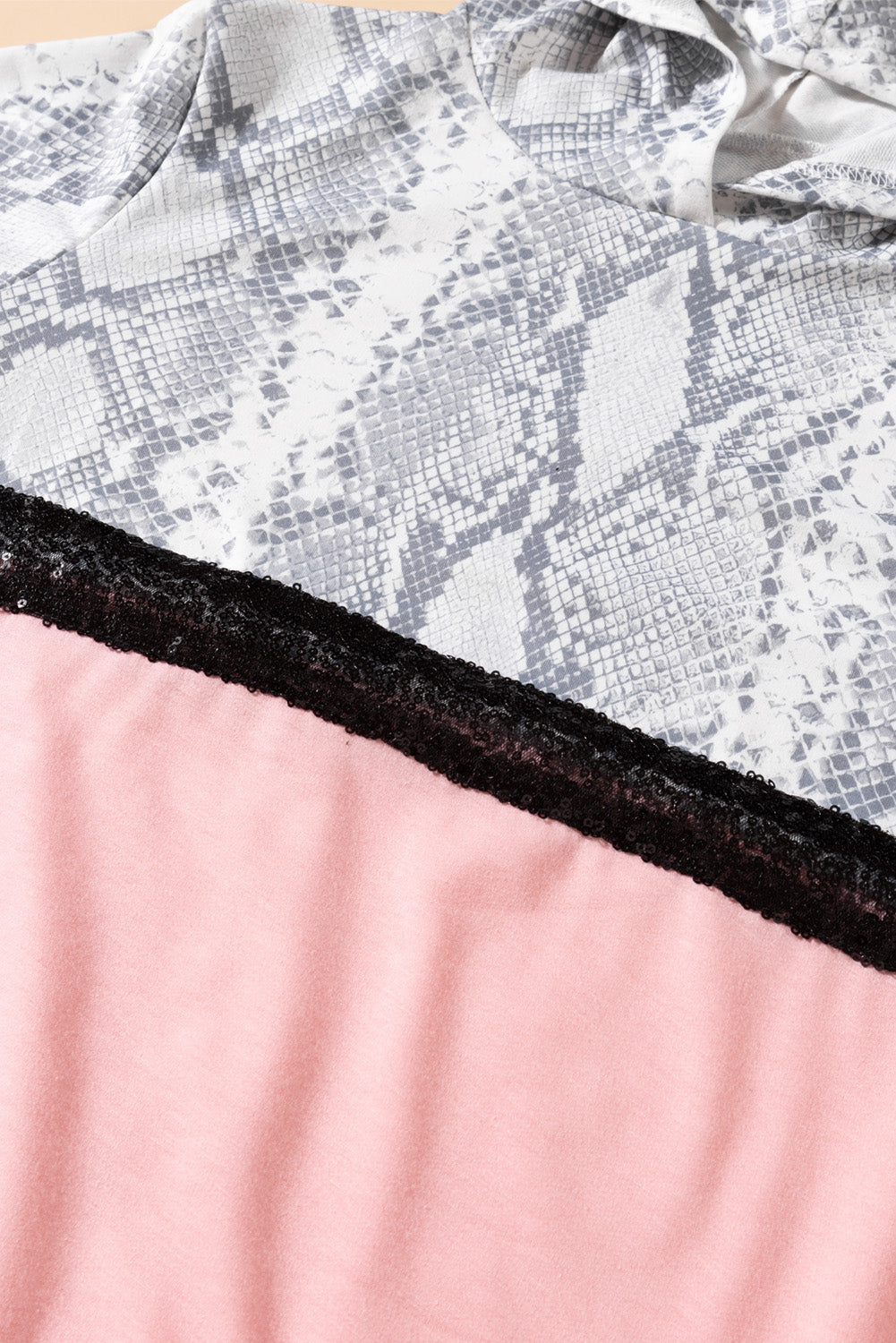 Girls Animal Print Sequined Hoodie featuring vibrant colors and stylish design, perfect for ages 4-13.