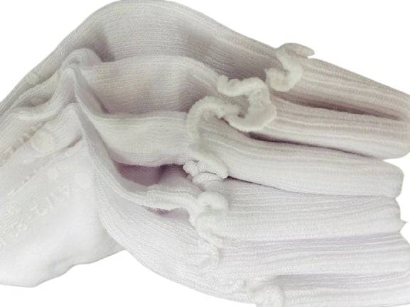 Girls Non-Skid Seamless Toe Socks in white with pink and white ruffle edges, showcasing a soft cotton material and non-skid dots on the bottom.