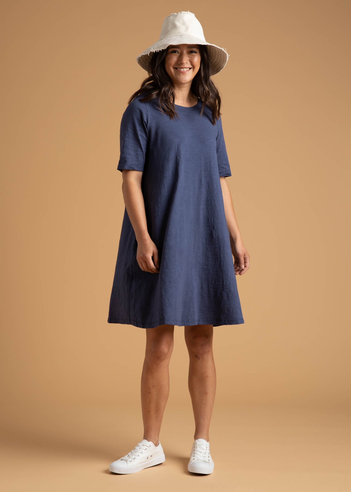 Good Tee Dress in Inky Blue, featuring a reversible design, side pockets, and made from organic cotton.