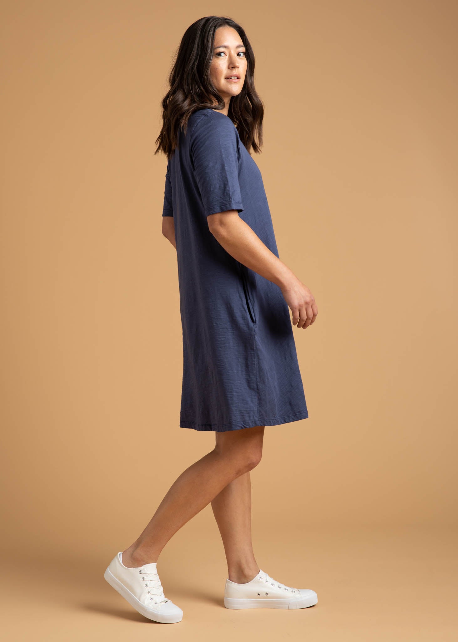 Good Tee Dress in Inky Blue, featuring a reversible design, side pockets, and made from organic cotton.