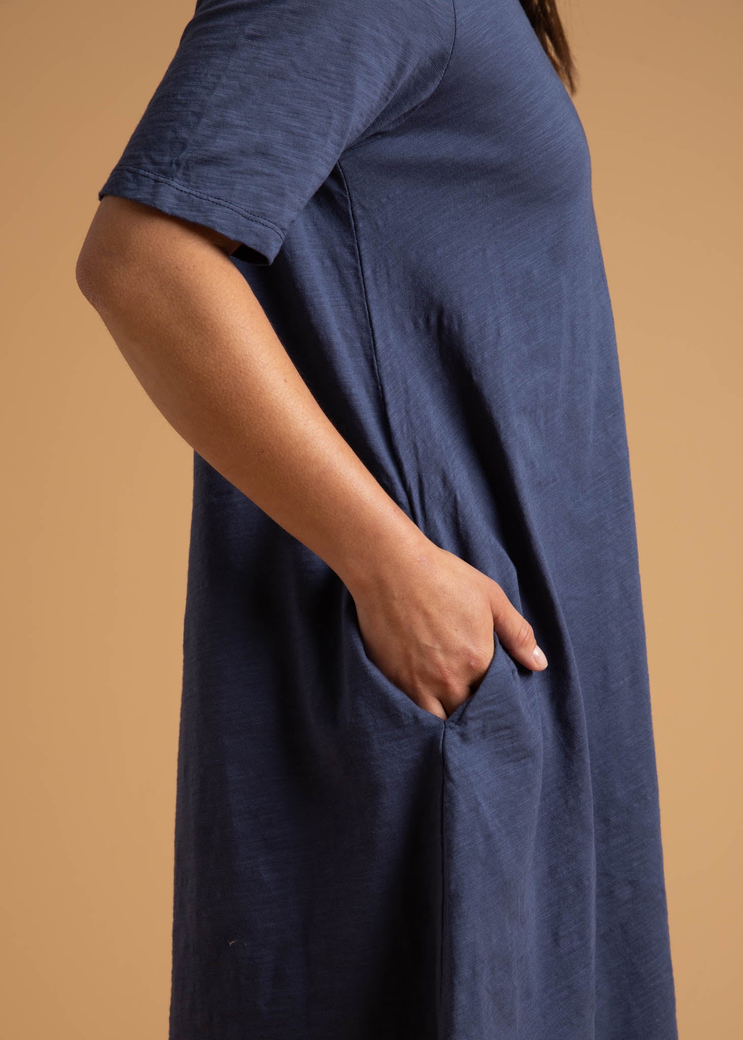 Good Tee Dress in Inky Blue, featuring a reversible design, side pockets, and made from organic cotton.