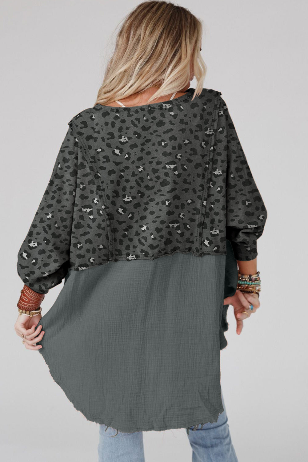 Gray Leopard Patchwork Raw Edge Oversized Top featuring a loose fit and edgy raw hem design, perfect for casual wear.