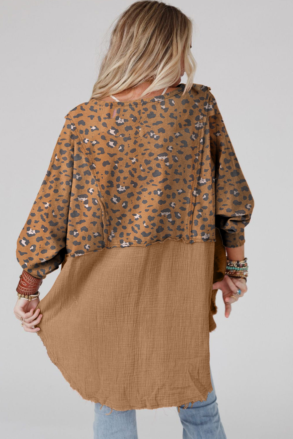 Gray Leopard Patchwork Raw Edge Oversized Top featuring a loose fit and edgy raw hem design, perfect for casual wear.