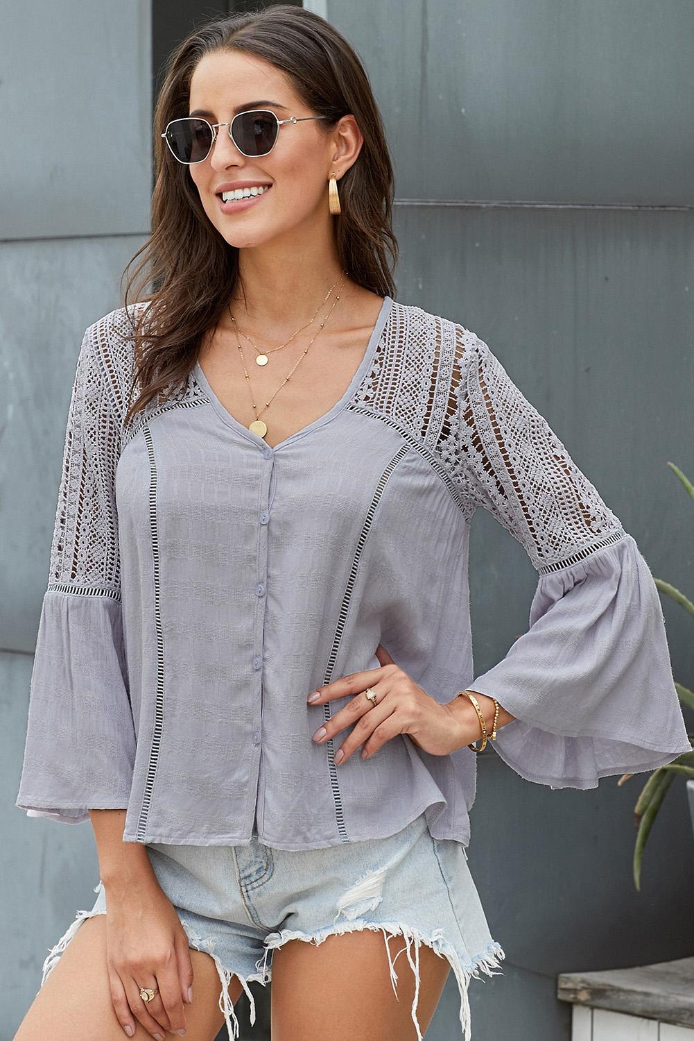 Gray crochet blouse with hollow out detailing and flowy bell sleeves, perfect for spring and autumn wear.