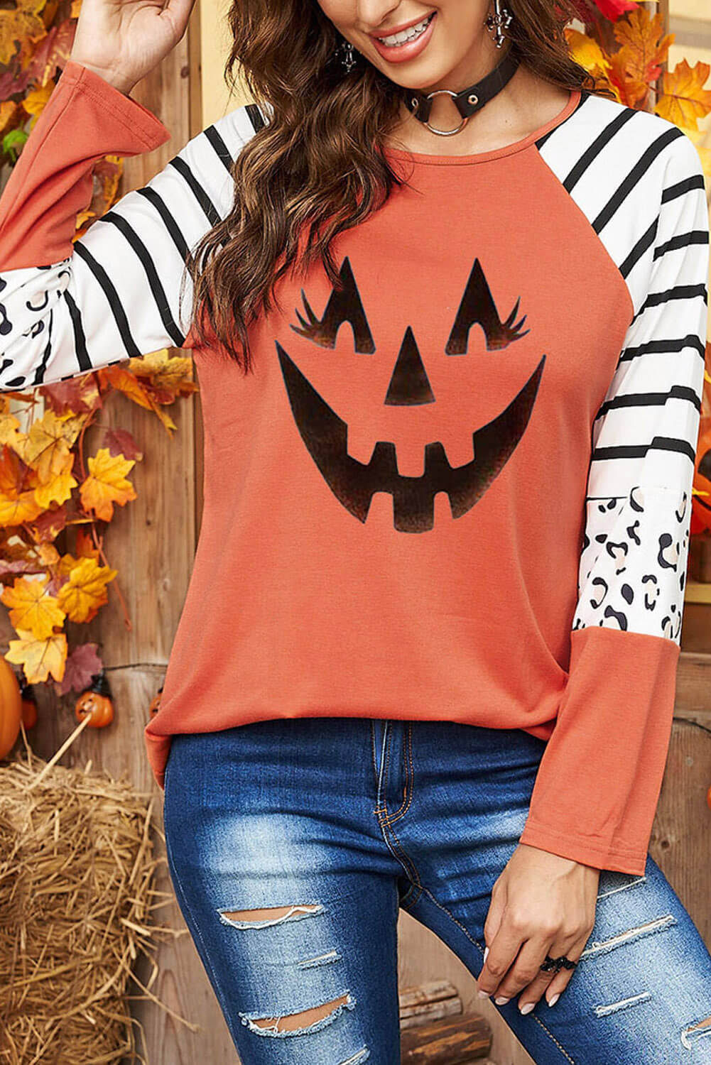 Halloween Graphic Mixed Print Raglan Sleeve Top featuring a mix of graphic, striped, and leopard prints with long sleeves.