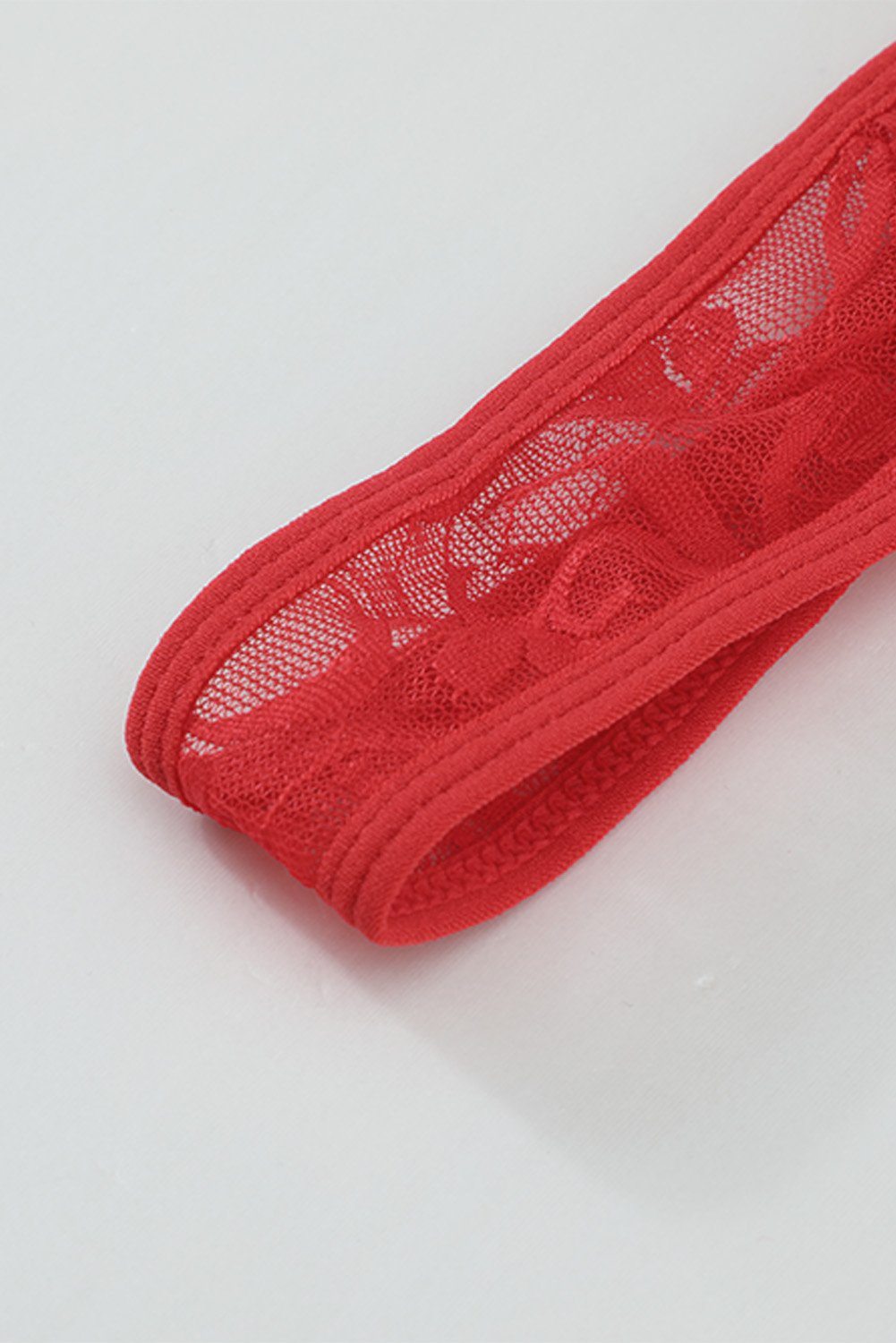 Halter Neck Backless Strappy Lace Teddy in red, showcasing intricate lace design and strappy details, perfect for intimate occasions.