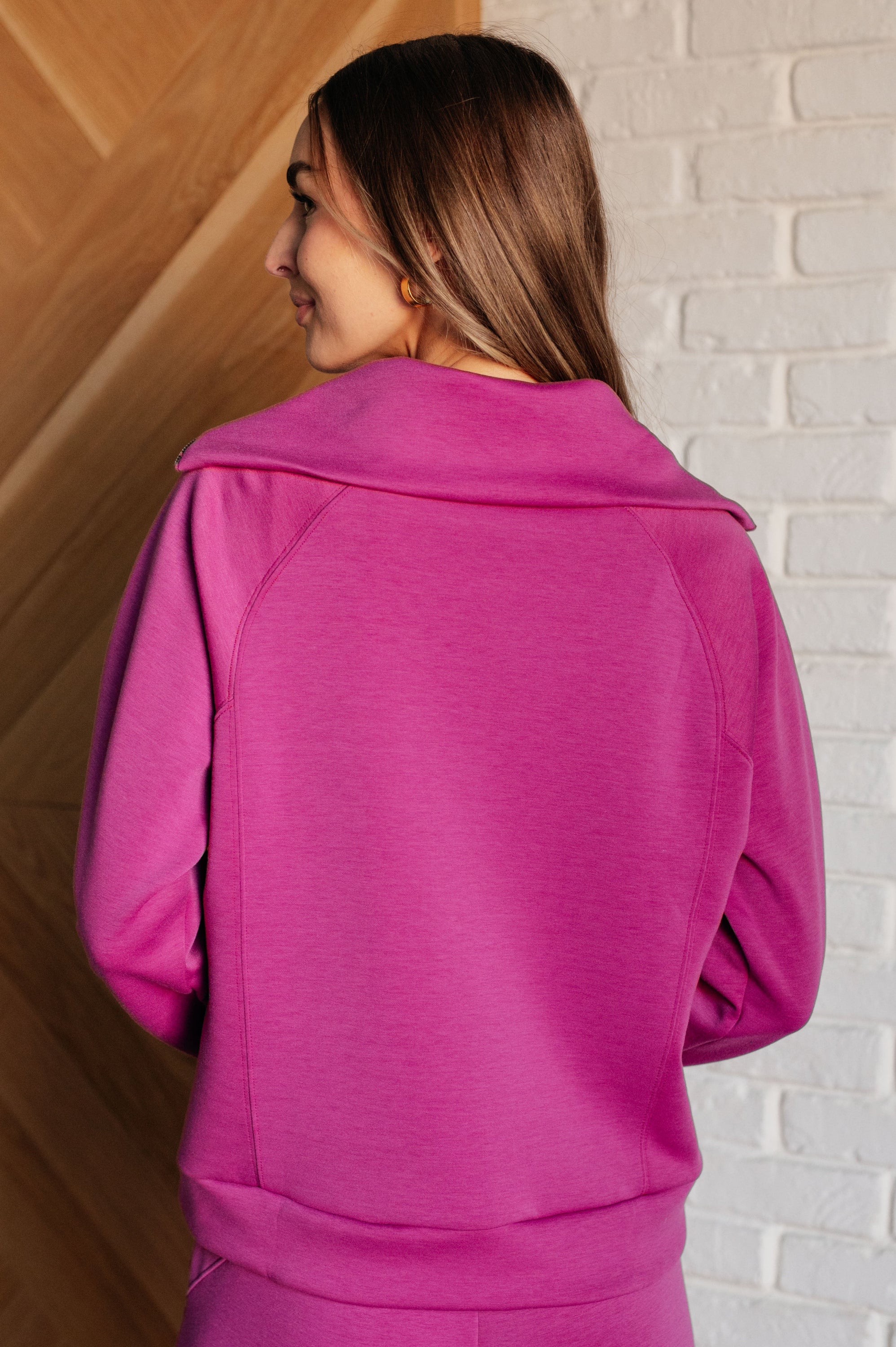 Hamptons Travel Half Zip Pullover in vibrant magenta, featuring a mock neck, raglan sleeves, and half zip closure, perfect for stylish travel.