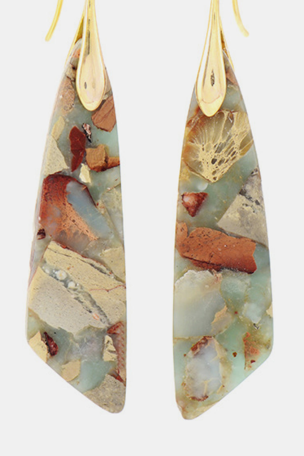 A pair of handmade dangle earrings featuring natural stones, copper, and gold plating, showcasing unique patterns and modern design.