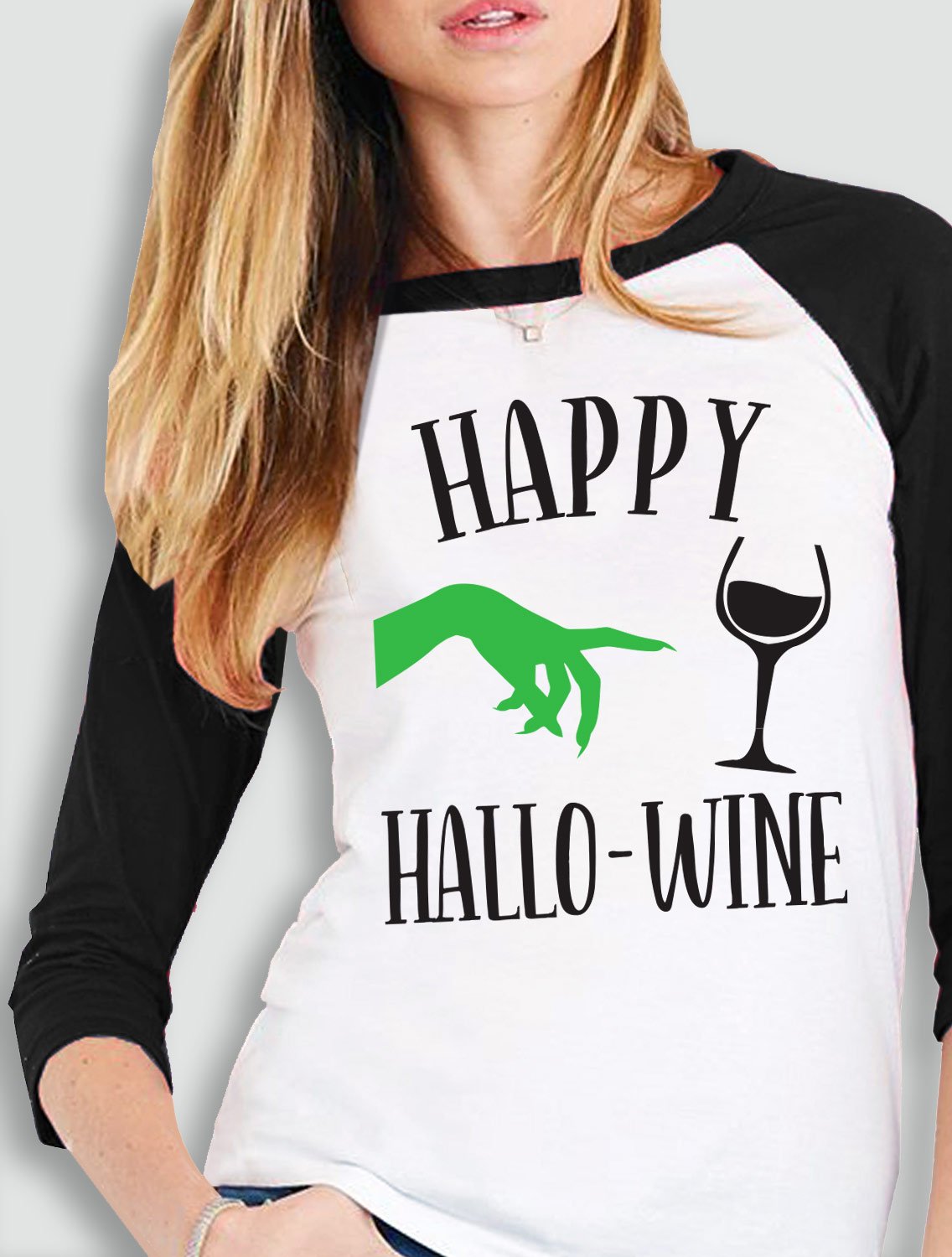 Happy HalloWine Witch Baseball Tee featuring a playful Halloween design with white body and black sleeves.