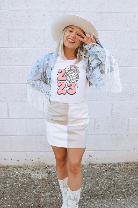 Person celebrating with 2023 shirt.