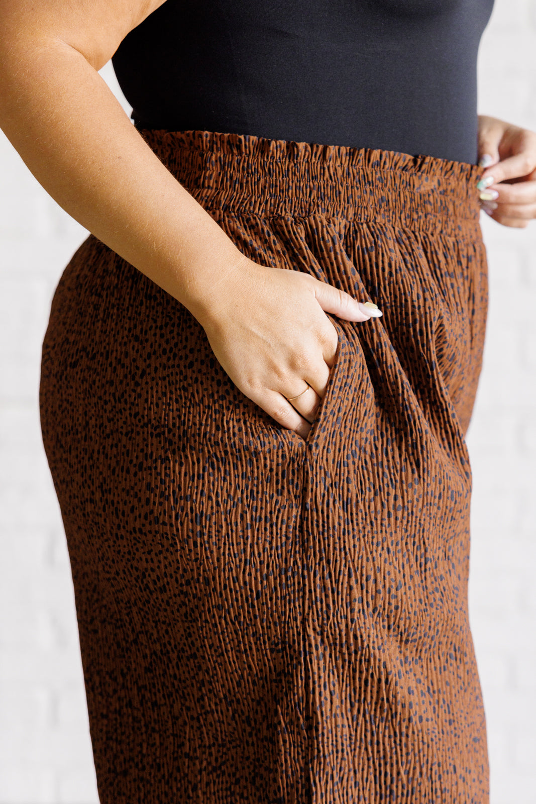 Harmony High Rise Wide Leg Pants in Brown with smocked waistband and polka dot print, showcasing a stylish wide leg design.
