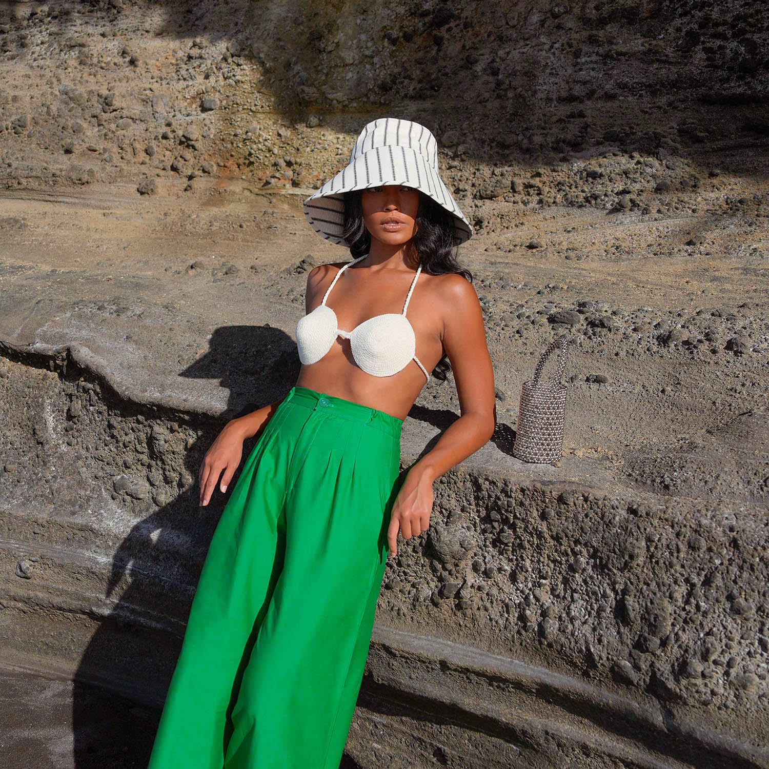 HARPER Handwoven Striped Wide-brim Hat featuring black and off-white stripes, made from soft Lurik fabric, ideal for beach and city wear.