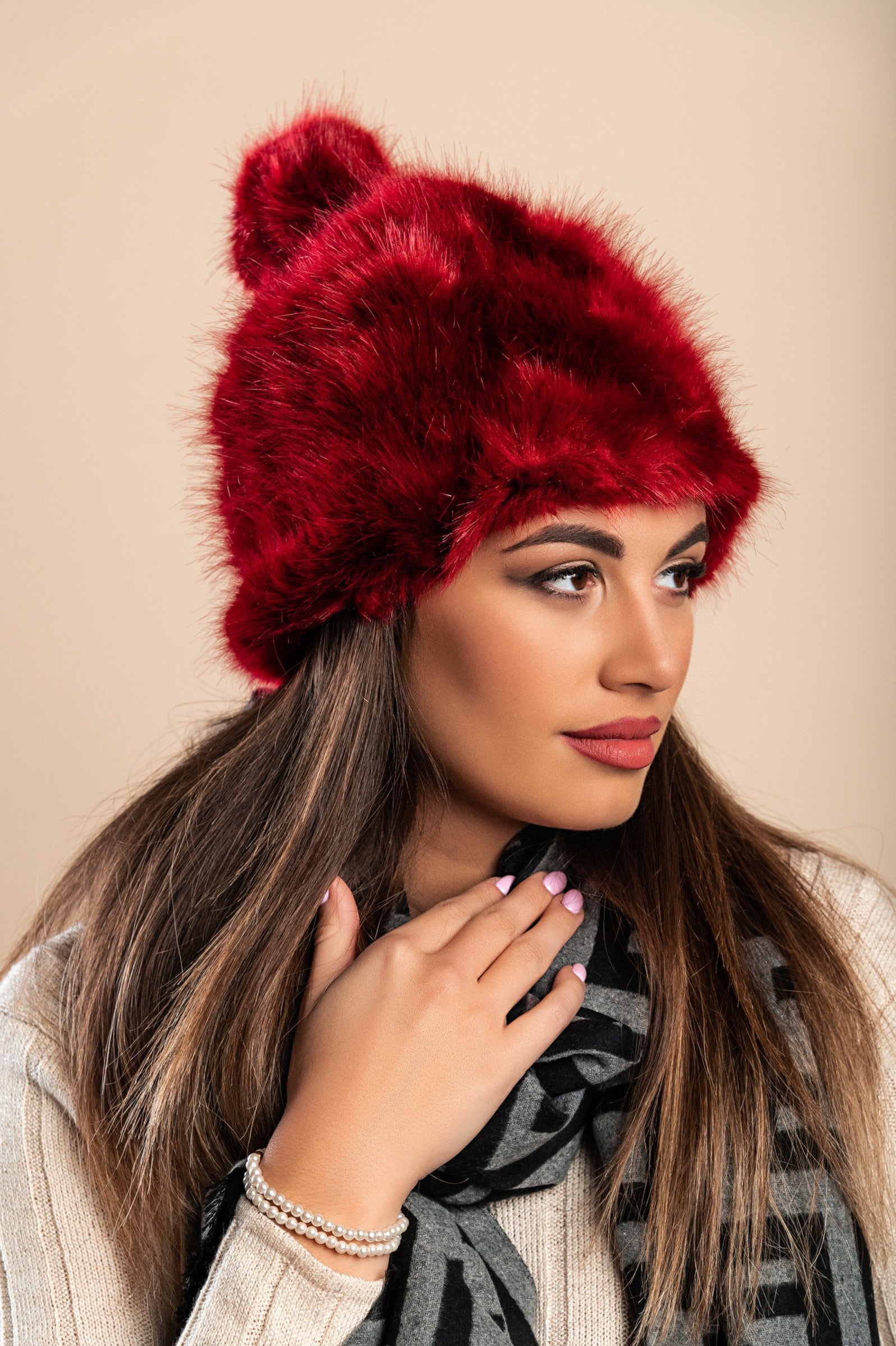 Elegant burgundy hat with soft synthetic fur, perfect for winter wear.