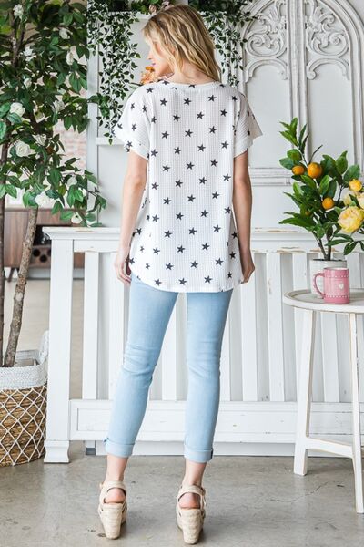 Heimish Full Size Star Print Short Sleeve V-Neck Waffle Knit T-Shirt featuring a playful star pattern and a flattering v-neckline.