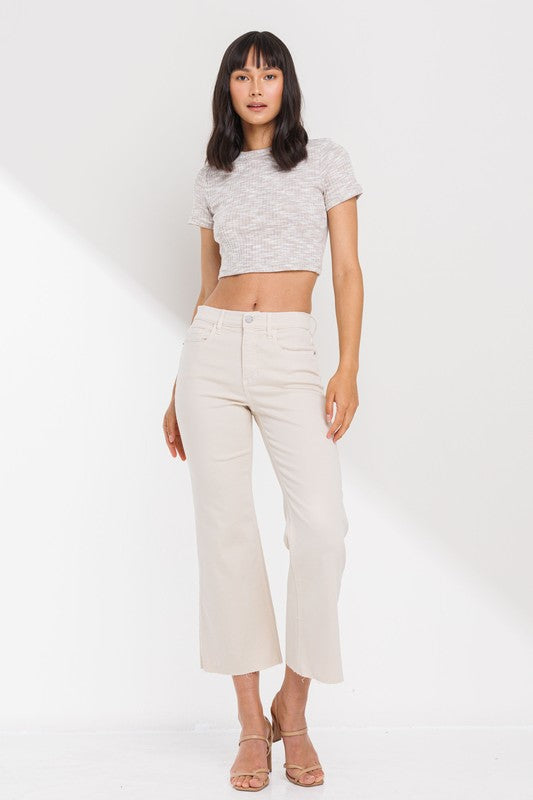 High Rise Cropped Kick Flare pants with raw scissor cut hem, displayed on a model standing 5'11" wearing size 26.