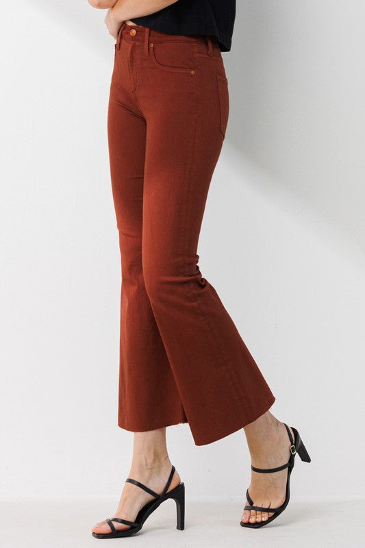 High Rise Cropped Kick Flare pants with a raw cut hem, showcasing a stylish and modern design.