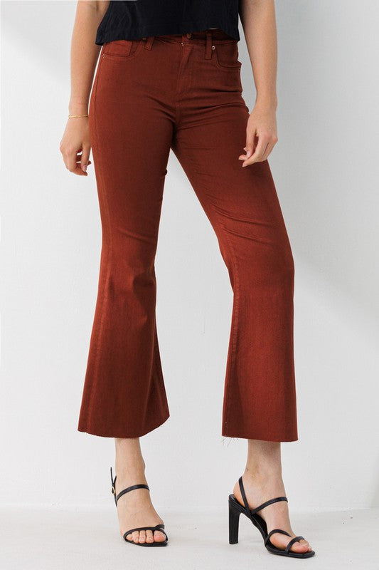 High Rise Cropped Kick Flare pants with a raw cut hem, showcasing a stylish and modern design.