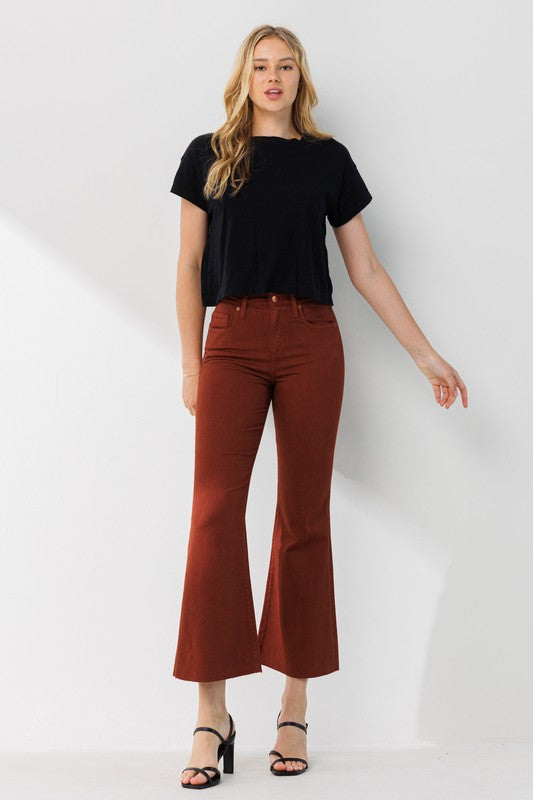 High Rise Cropped Kick Flare pants with a raw cut hem, showcasing a stylish and modern design.