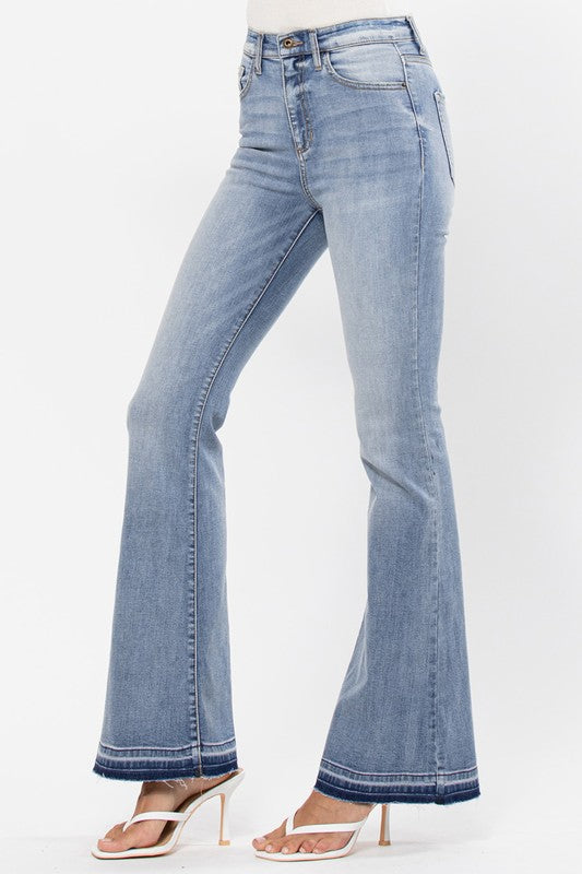 High Rise Flare pant with bottom detail and raw cut hem, displayed on a model standing 5'11" wearing size 26.