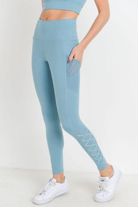 Highwaist Hybrid Mesh & Lattice Straps Full Pocket Leggings showcasing stylish mesh panels and functional side pockets.