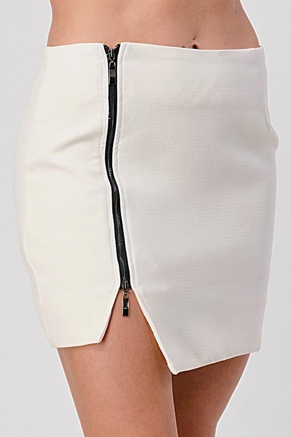 A stylish side zipper detail mini skirt displayed on a model, showcasing its trendy design and flattering fit.