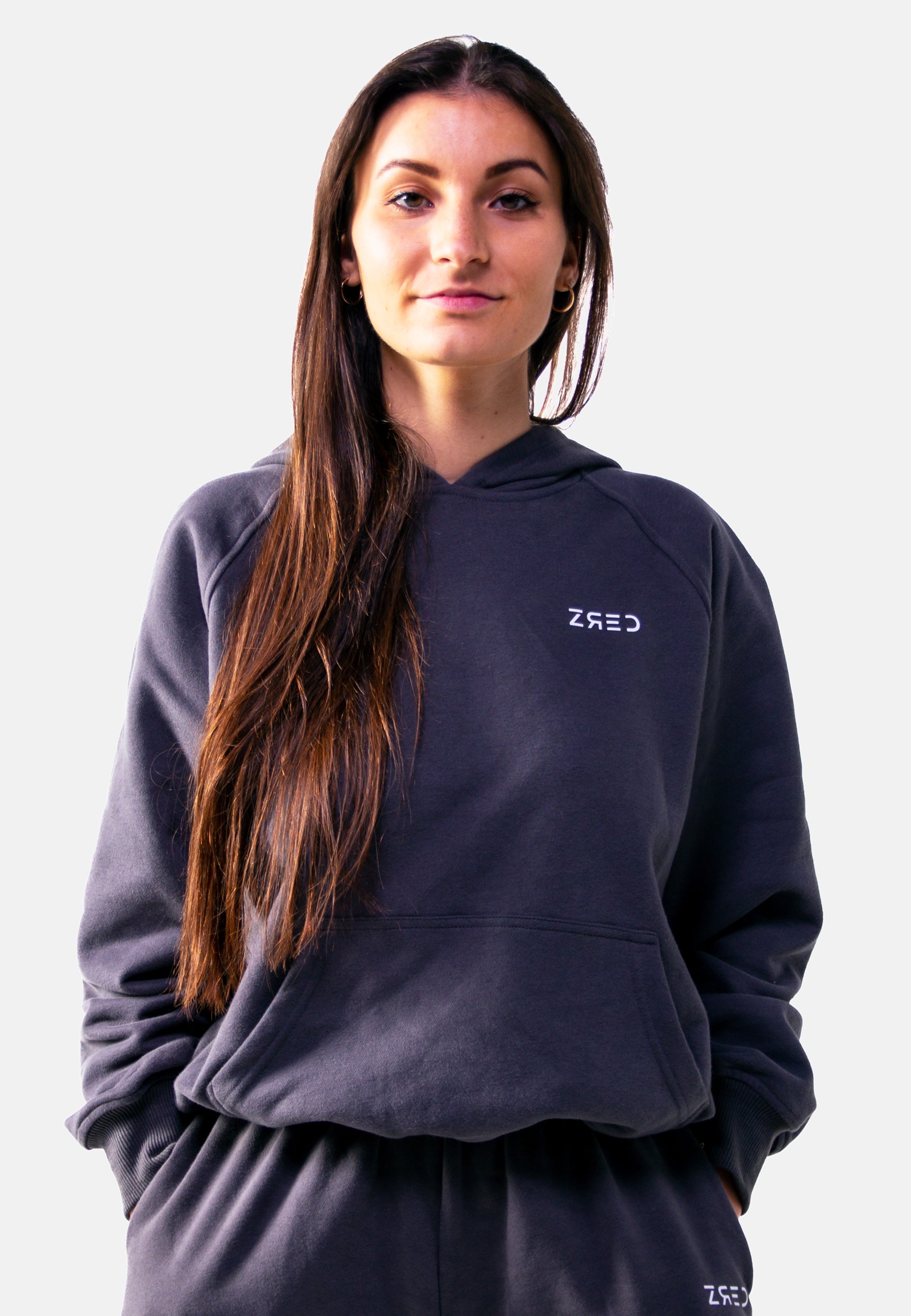 Dunkelgrauer Damen Hoodie Static mit gefütterter Bauchtasche und lockerer Passform, ideal für Alltag und Entspannung.