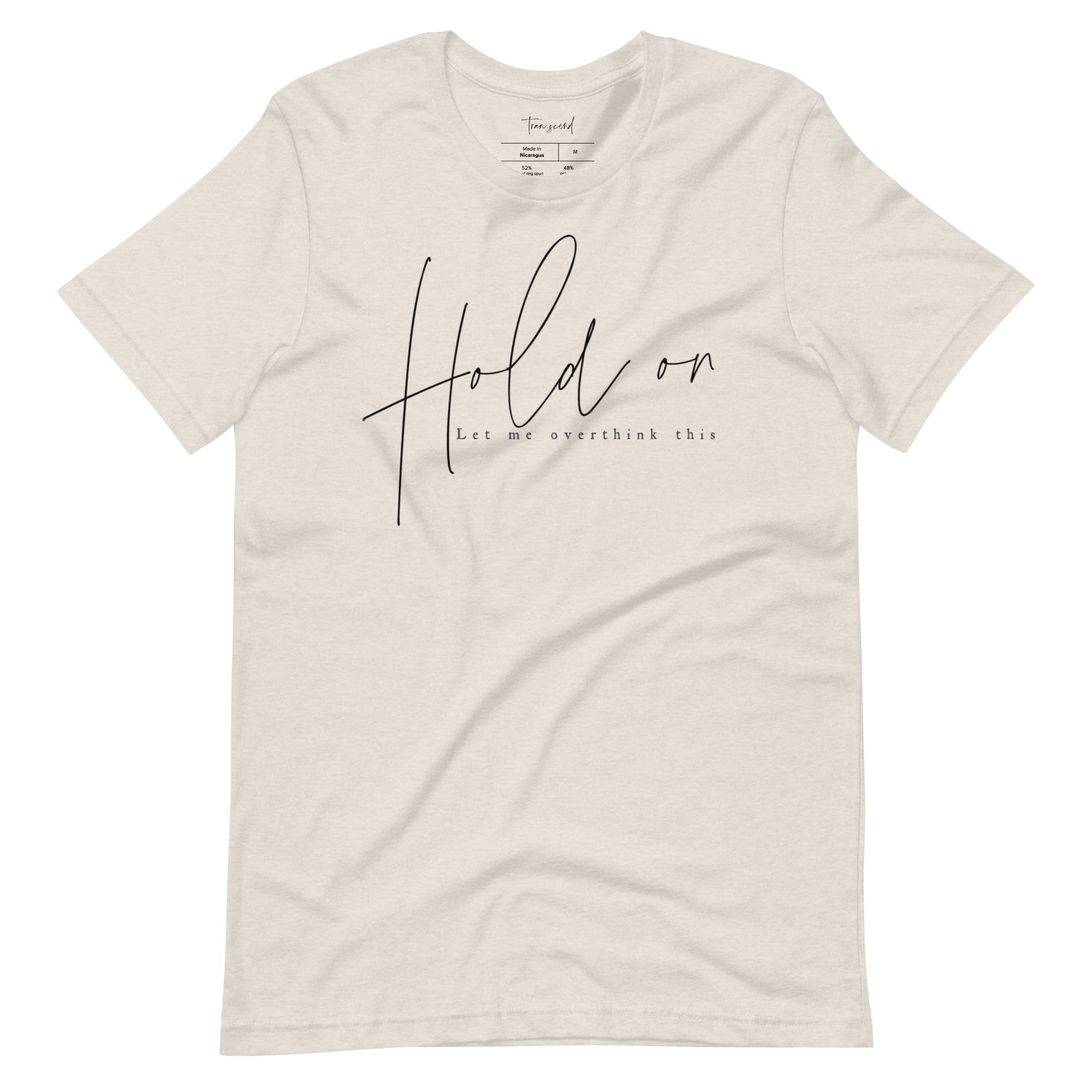A soft and breathable unisex tee featuring the phrase 'Hold On Let Me Overthink This' in a stylish font, available in various colors.