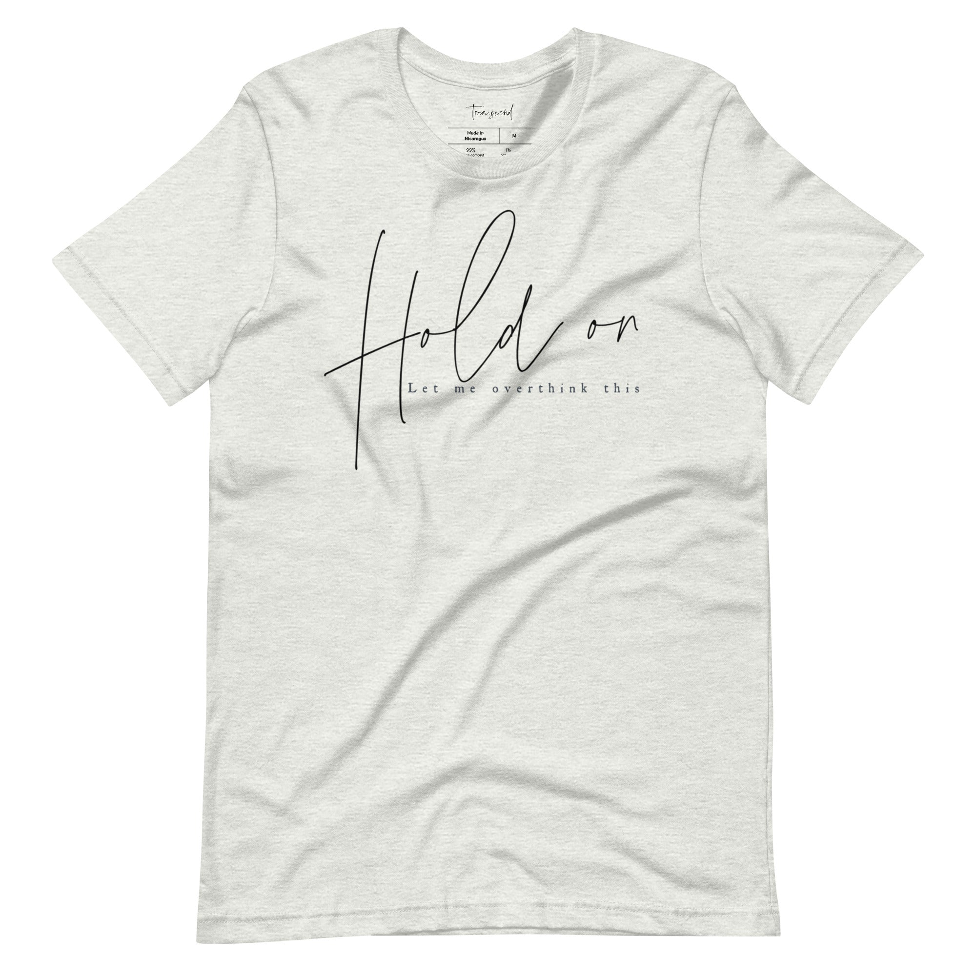 A soft and breathable unisex tee featuring the phrase 'Hold On Let Me Overthink This' in a stylish font, available in various colors.