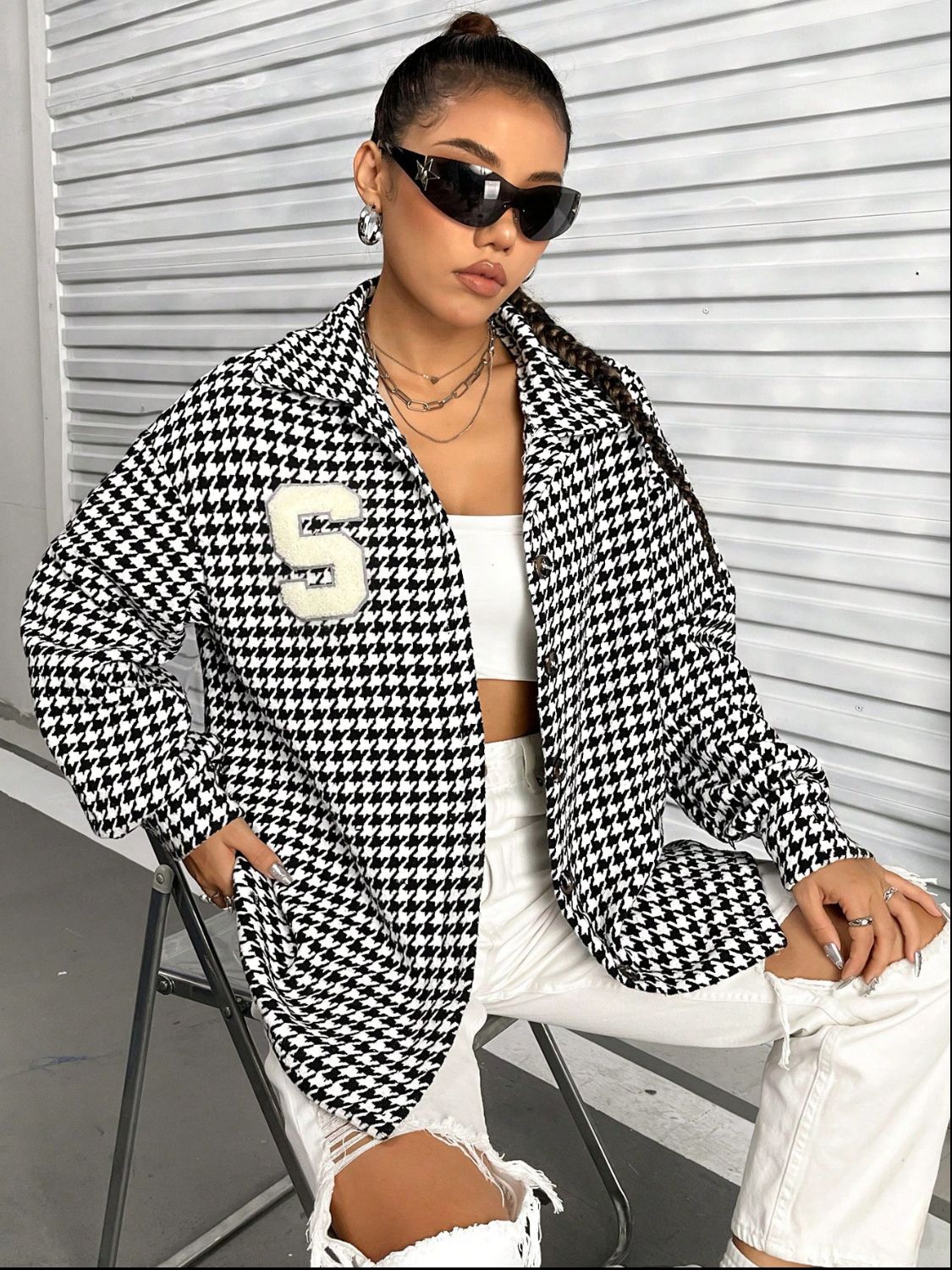 Houndstooth Button Down Long Sleeve Shacket featuring a classic pattern, button-down front, and long sleeves, made from a soft polyester and spandex blend.