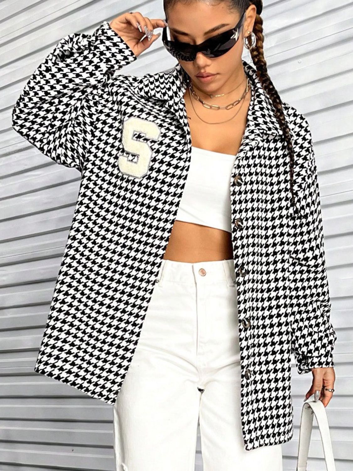 Houndstooth Button Down Long Sleeve Shacket featuring a classic pattern, button-down front, and long sleeves, made from a soft polyester and spandex blend.
