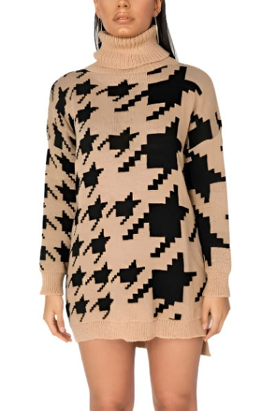 A stylish Houndstooth Check Roll Neck Jumper Dress displayed on a mannequin, featuring a cozy roll neck and a chic houndstooth pattern.