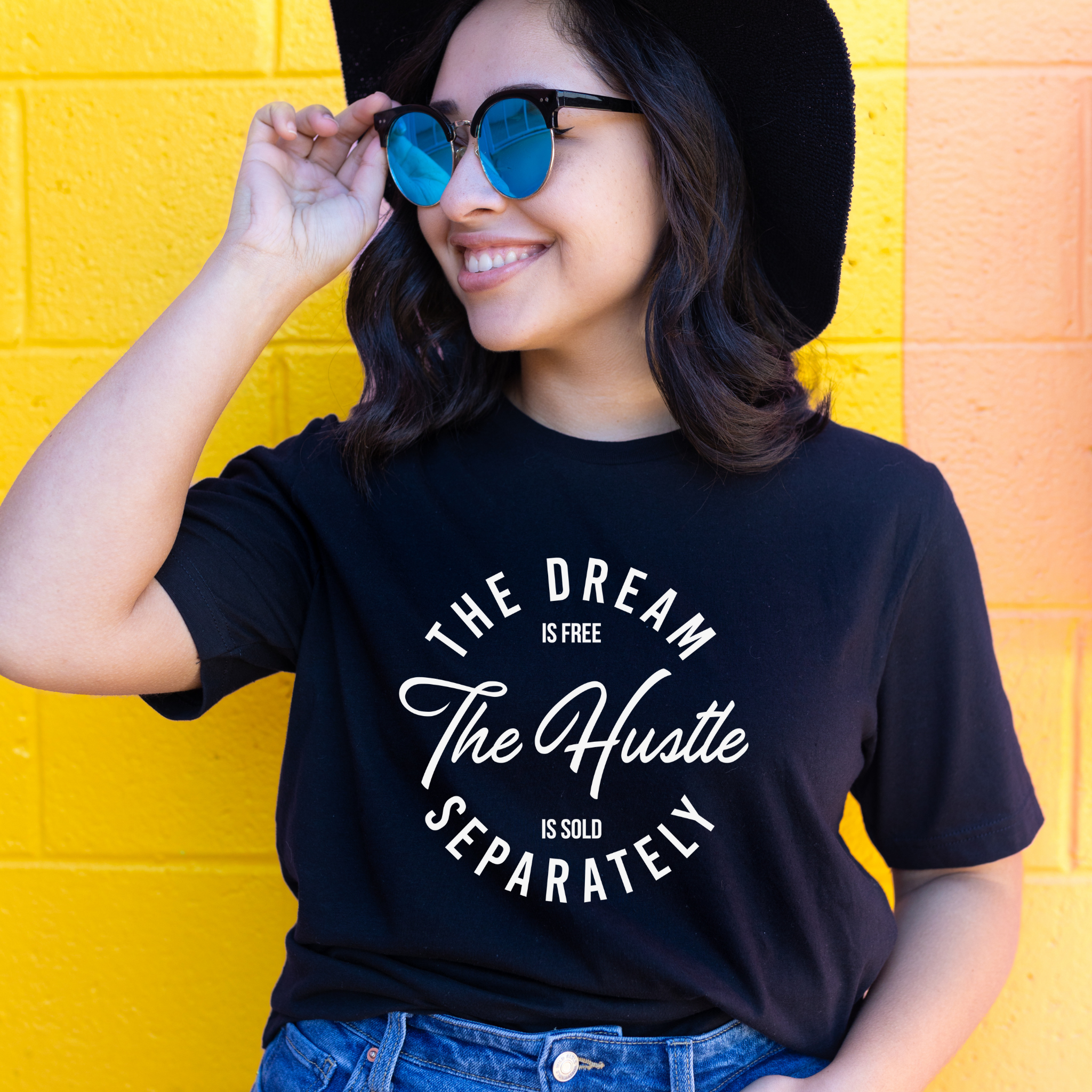 A stylish black tee with bold white lettering that reads 'HUSTLE SOLD SEPARATELY', perfect for motivational wear.